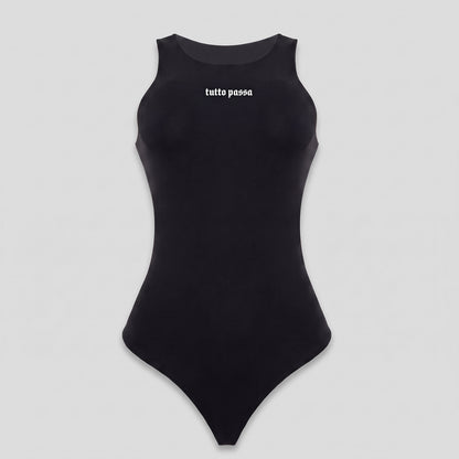 A black sleeveless bodysuit with the white text 'tutto passa' printed across the chest, displayed on a neutral light gray background.